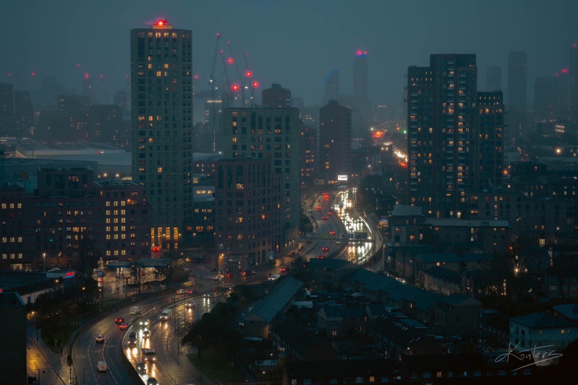 London skyline through fog at dusk